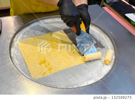 Making traditional Thai ice cream on a cold plate freezer. Thai street food. Dessert. 132589273