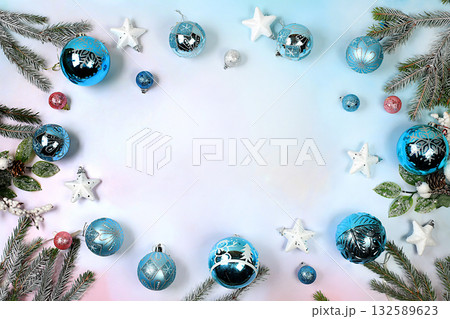 Beautiful Christmas and New Year background with lights, decorations, toys with fir branches with place for text. Holiday card, banner on screen, product setup for holiday advertising, Beautiful Christmas and New Year background with lights, decorations, toys with fir branches with place for text. Holiday card, banner on screen, product setup for holiday advertising, 132589623