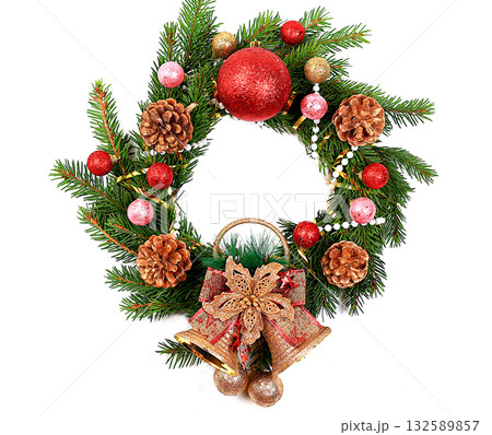 Christmas wreath made of live fir branches and toys on a white background, template for design, concept of Christmas and New Year's Eve, banner for content advertising . New Year card, 132589857