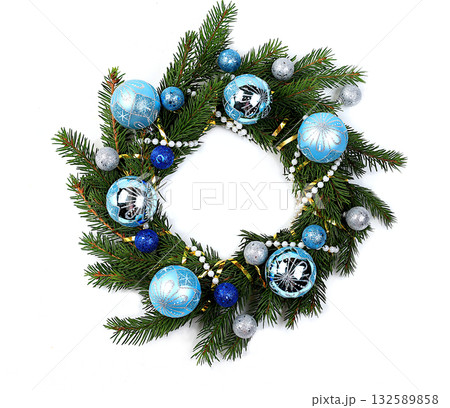 Christmas wreath made of live fir branches and toys on a white background, template for design, concept of Christmas and New Year's Eve, banner for content advertising . New Year card, 132589858