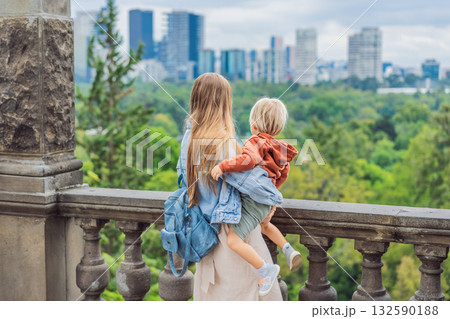 Mother with her young son near Chapultepec Castle in Mexico City, enjoying a cultural family trip. Parenthood, love, heritage sightseeing, and family bonding travel concept 132590188