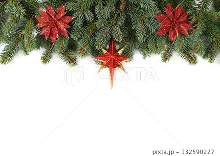 Christmas and New Year 2025 composition, background with blue fir branches with festive decorations on a light table, banner for holiday screen, template for design. Holiday card, selective focus, 132590227