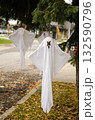 Halloween Ghost Decorations Hanging from Tree Outdoors Halloween Ghost Decorations Hanging from Tree Outdoors 132590796