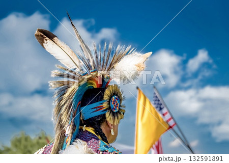 Traditional headdress with feathers against blue sky Traditional headdress with feathers against blue sky 132591891