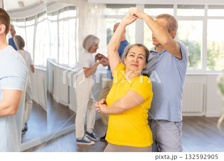 Couple of elderly man and woman dancing waltz 132592905