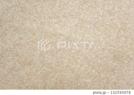 Beige felt texture background. Soft fabric surface with fuzzy fibers, warm neutral textile material for design or craft backdrop. Beige felt texture background. Soft fabric surface with fuzzy fibers, warm neutral textile material for design or craft backdrop. 132593078