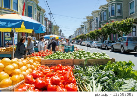 Vibrant Farmers Market with Fresh Produce in Urban Neighborhood Under Clear Blue Sky 132598095
