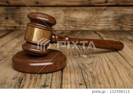 Wooden Gavel on Rustic Wood Background for Legal Justice and Courtroom Concept 132598113