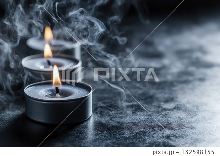 Trio of Floating Scented Candles with Gentle Vapor Trails in Dim Light Setting Trio of Floating Scented Candles with Gentle Vapor Trails in Dim Light Setting 132598155