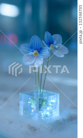 Blue Flowers in Acrylic Cube with Sparkles Blue Flowers in Acrylic Cube with Sparkles 132598705