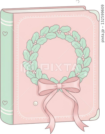 Cute pastel pink book with a festive holly wreath and bow 132599609