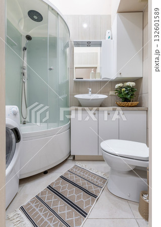 Bright Modern Bathroom with Shower Cabin and Toilet Bright Modern Bathroom with Shower Cabin and Toilet 132601589