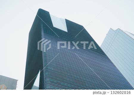 low and wide angle view with high mirror building with sky 132602816
