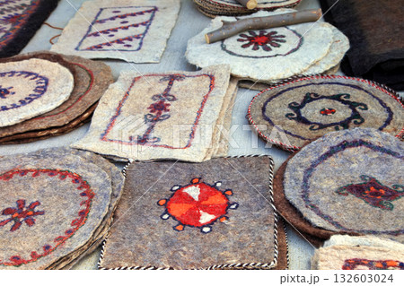 Handmade rugs made from sheep's wool. Turkmenistan. Ashkhabad market. Handmade rugs made from sheep's wool. Turkmenistan. Ashkhabad market. 132603024