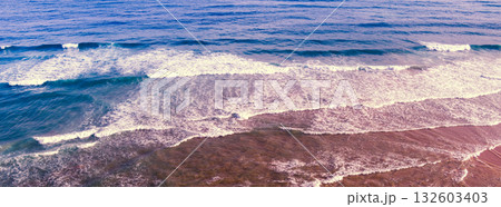 Ocean surf. Waves roll onto the shore. View from above. Horizontal banner Ocean surf. Waves roll onto the shore. View from above. Horizontal banner 132603403