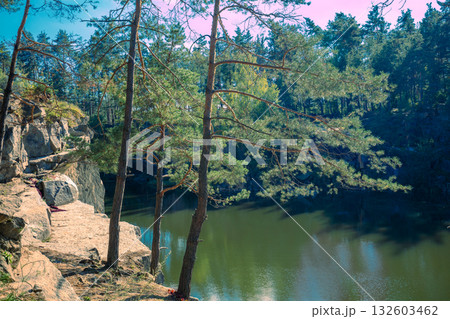 Beautiful rocky lakeshore of mountain lake. Summer landscape. Wilderness, serenity lake 132603462