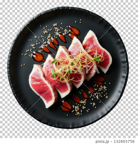 Delicious bigeye tuna sashimi, fresh Japanese food with daikon sprout and sesame, served on dark plate 132603756