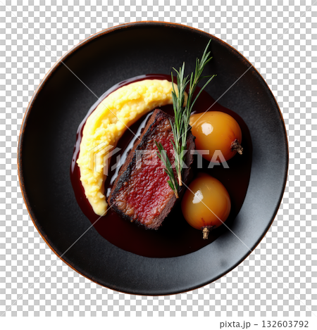 Appetizing braised short rib beef with creamy polenta and savory red wine reduction on dark gourmet plate 132603792