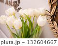 Bouquet of white tulips on the ground. Aesthetic. Pleasing. Gift idea. Love. Mother. 8 March 132604667
