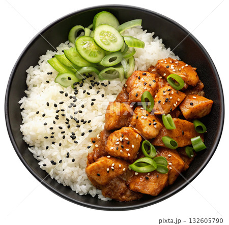 spicy teriyaki chicken chunks served with rice 132605790