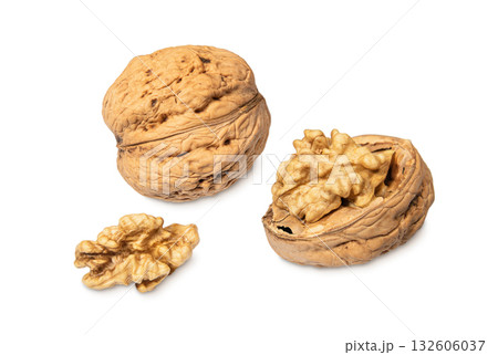 Whole and peeled walnuts isolated on a white background Whole and peeled walnuts isolated on a white background 132606037