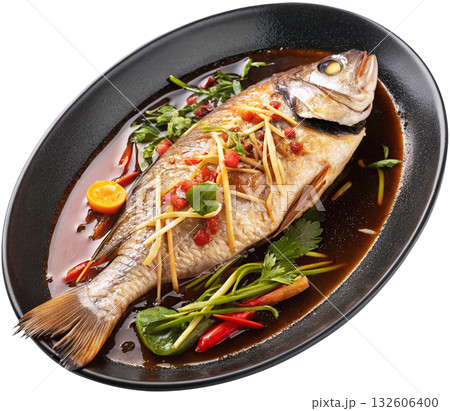 snapper fish steamed with soy sauce snapper fish steamed with soy sauce 132606400