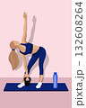 A faceless fitness woman performs a kettlebell stretch on a yoga mat in a bright, home workout space. 132608264