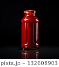 A jar with tomato sauce isolated on black. A blank ketchup jar product photo. 132608903