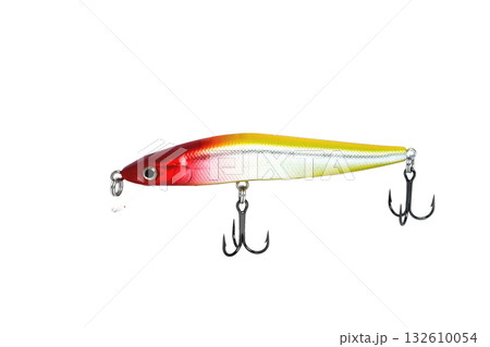 Fishing wobbler with red head, yellow back and white belly. Close-up on a white background. 132610054
