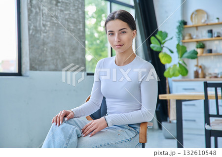 Portrait of beautiful stylish young teenage girl posing at home 132610548