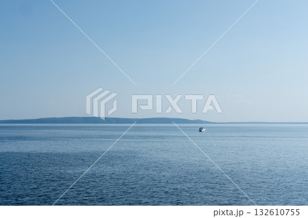 The Volga embankment in Tolyatti, Russia. The wide river offers a beautiful view of the hills. The Volga embankment in Tolyatti, Russia. The wide river offers a beautiful view of the hills. 132610755