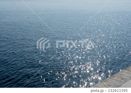 beautiful view of the water in the sea sparkling in the sun's rays 132611395