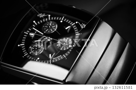 A detailed close-up of a luxury chronograph wristwatch, 132611581