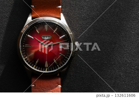 A mechanical automatic calendar mens watch with red sunburst dial A mechanical automatic calendar mens watch with red sunburst dial 132611606
