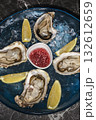 fresh galician raw oysters on ice in gourmet vigo restaurant table in spain 132612659