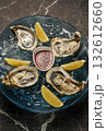 fresh galician raw oysters on ice in gourmet vigo restaurant table in spain 132612660