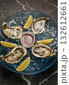 fresh galician raw oysters on ice in gourmet vigo restaurant table in spain 132612661