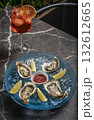 fresh galician raw oysters on ice in gourmet vigo restaurant table in spain 132612665