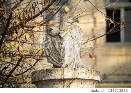 A statue of two birds on a pedestal A statue of two birds on a pedestal 132613238
