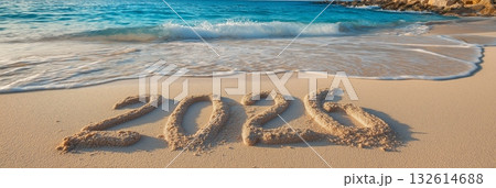 2026 banner. Happy New Year 2026 written on beach sand 132614688