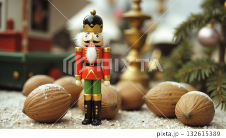 A charming Nutcracker soldier guards walnuts and a whimsical castle. A fairytale atmosphere of New Year and Christmas, Christmas Eve, magic and witchcraft. A charming Nutcracker soldier guards walnuts and a whimsical castle. A fairytale atmosphere of New Year and Christmas, Christmas Eve, magic and witchcraft. 132615389