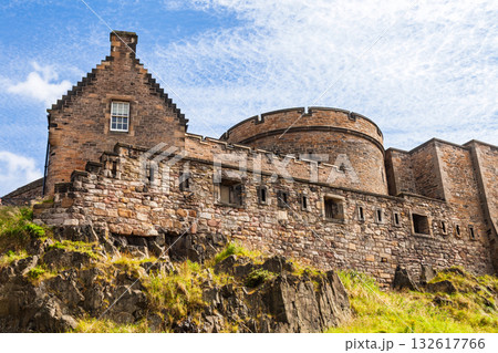 Medieval stone walls of Edinburgh Castle under blue sky Medieval stone walls of Edinburgh Castle under blue sky 132617766
