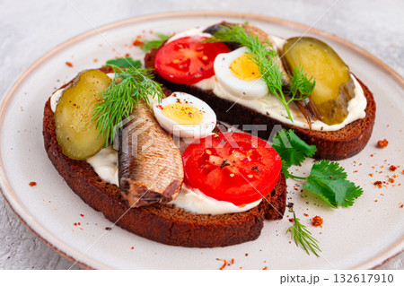 sandwiches on rye bread, with sprats, quail eggs, fresh tomatoes and pickled cucumber, appetizer, breakfast, homemade, sandwiches on rye bread, with sprats, quail eggs, fresh tomatoes and pickled cucumber, appetizer, breakfast, homemade, 132617910