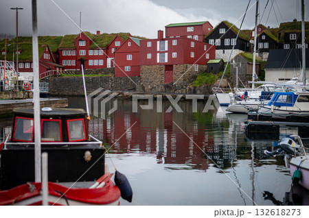 Torshawn city, the capital of The Faroe Islands, Denmark. Vestaravag harbor in Torshavn with its boats and colorful buildings. High quality photo Torshawn city, the capital of The Faroe Islands, Denmark. Vestaravag harbor in Torshavn with its boats and colorful buildings. High quality photo 132618273