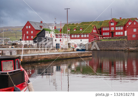 Torshawn city, the capital of The Faroe Islands, Denmark. Vestaravag harbor in Torshavn with its boats and colorful buildings. High quality photo Torshawn city, the capital of The Faroe Islands, Denmark. Vestaravag harbor in Torshavn with its boats and colorful buildings. High quality photo 132618278