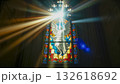 A ray of bright sun passes through the stained glass of the cathedral, as a sign of God, shimmering and shining in the glass, Catholic faith. 132618692