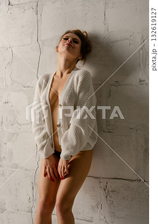 Couple embracing love in intimate lingerie moments indoors Couple embracing love in intimate lingerie moments indoors 132619127