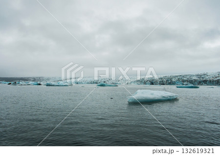Jokulsarlon is a glacial lake in Iceland, located south of the Vatnajkull glacier, by a black sand beach, which overlooks the Atlantic Ocean 132619321
