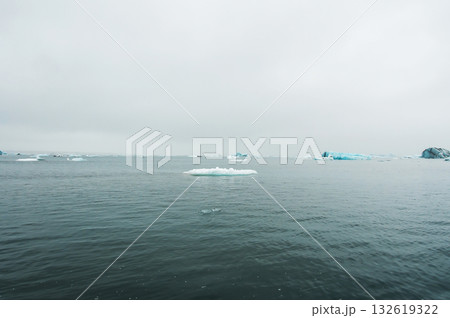 Jokulsarlon is a glacial lake in Iceland, located south of the Vatnajkull glacier, by a black sand beach, which overlooks the Atlantic Ocean 132619322