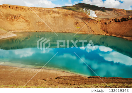 Blue lagoon in the crater of the Vti volcano, over 300 meters in diameter, in Iceland 132619348